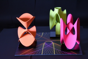 Three views of a projective cubic surface - math art and also photo by Oliver Labs, 2025